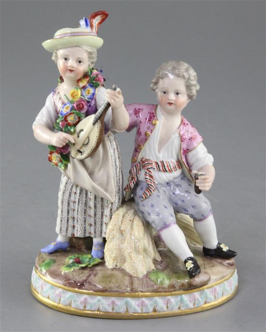 A Meissen group of a young couple, late 19th century, height 15.5cm, losses